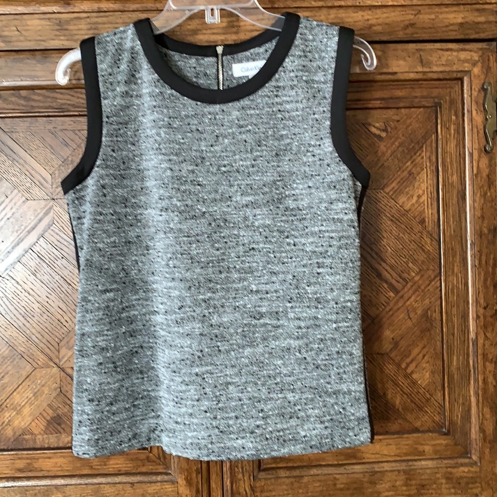 NWOT. Calvin Klein lovely knit top with black trim. Excellent condition.